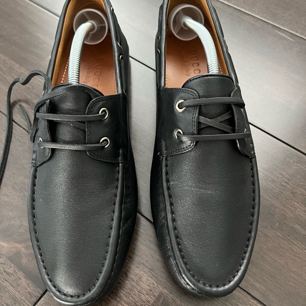 Black Gucci men’s loafers with laces. Size 10 and a half.